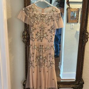 Blush color, heavily beaded feminine dress